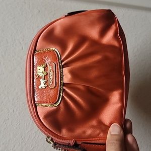Cute coach make up bag peach color